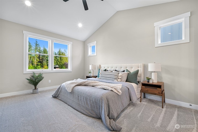 bedroom with lofted ceiling, carpet, and ceiling fan