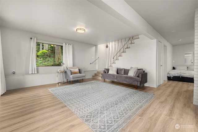 living room with light hardwood / wood-style flooring