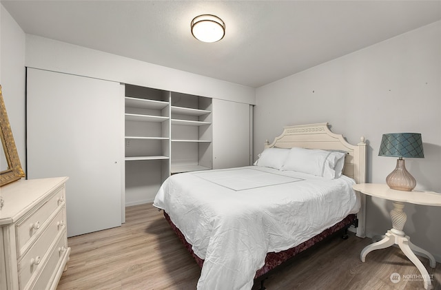 bedroom featuring light wood-type flooring