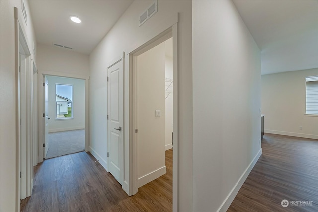 hallway featuring dark hardwood / wood-style floors