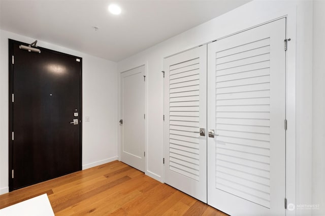 entrance foyer with light wood-type flooring