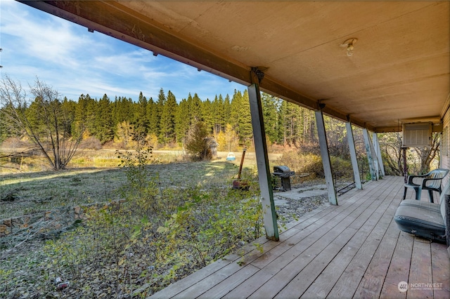 deck featuring a yard