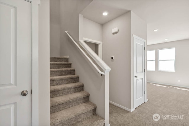 stairway with carpet flooring