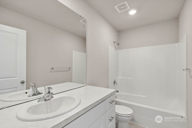 full bathroom with vanity, toilet, and bathing tub / shower combination