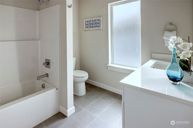 full bathroom with toilet, vanity, tile patterned flooring, and  shower combination