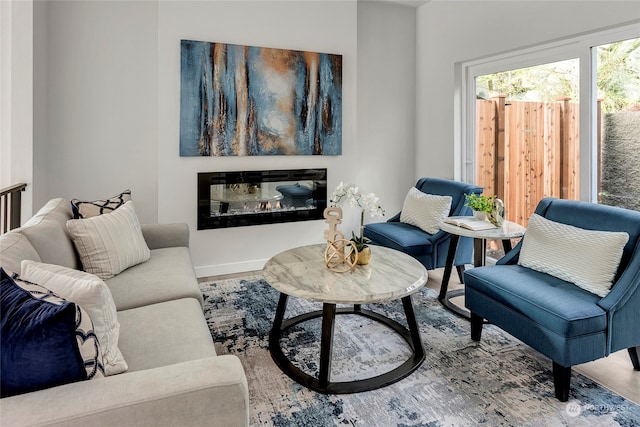 living area featuring hardwood / wood-style floors