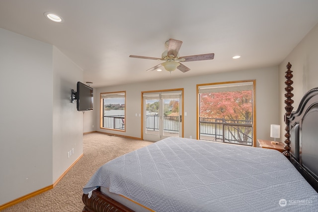 bedroom with ceiling fan, light carpet, and access to exterior