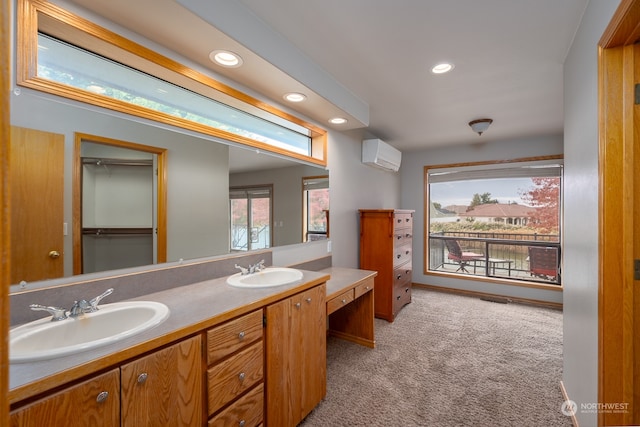 bathroom featuring vanity and a wall mounted AC