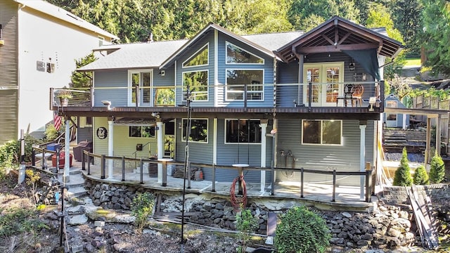 rear view of house with a deck