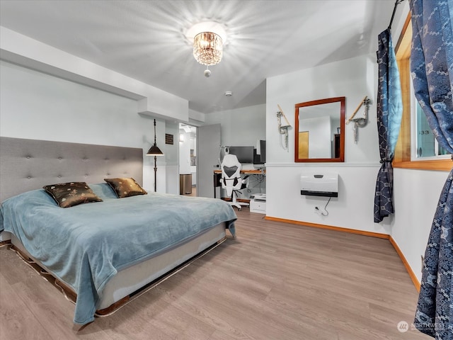 bedroom featuring hardwood / wood-style floors