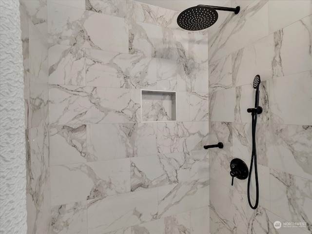 details featuring tiled shower