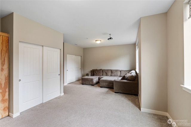 living room with light carpet