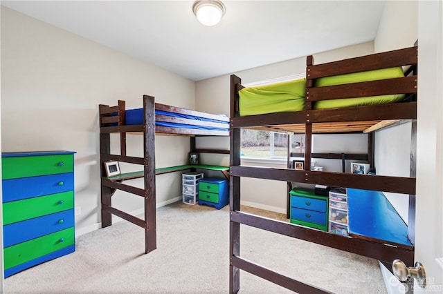 bedroom with light colored carpet