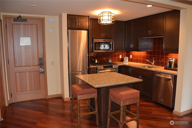 3600 Suncadia Trl Unit 5059, Cle Elum, WA 98922 - kitchen featuring stainless steel appliances, a sink, baseboards, dark wood-style flooring, and recessed lighting