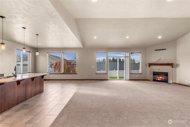 living room with light carpet and sink