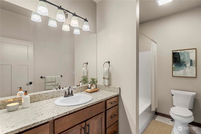 full bathroom with tile patterned floors, vanity, shower / bath combination with curtain, and toilet