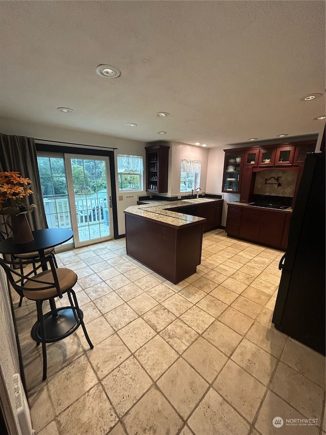 kitchen featuring a textured ceiling