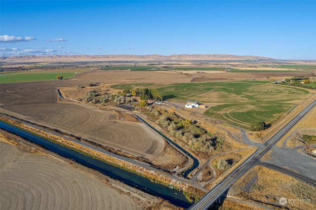 aerial view featuring a mountain view and a rural view