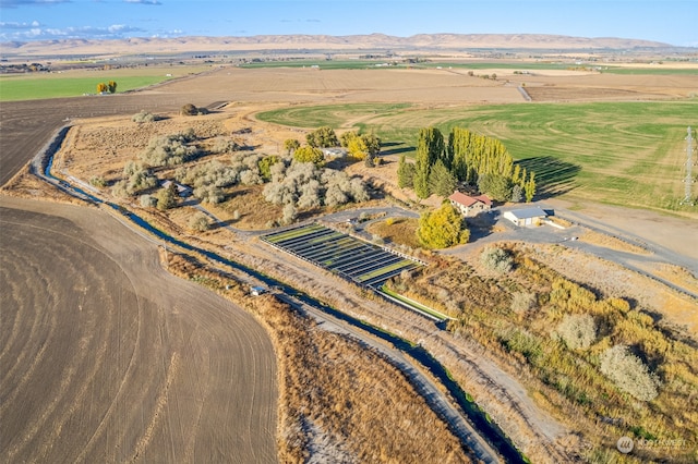 bird's eye view featuring a rural view and a mountain view