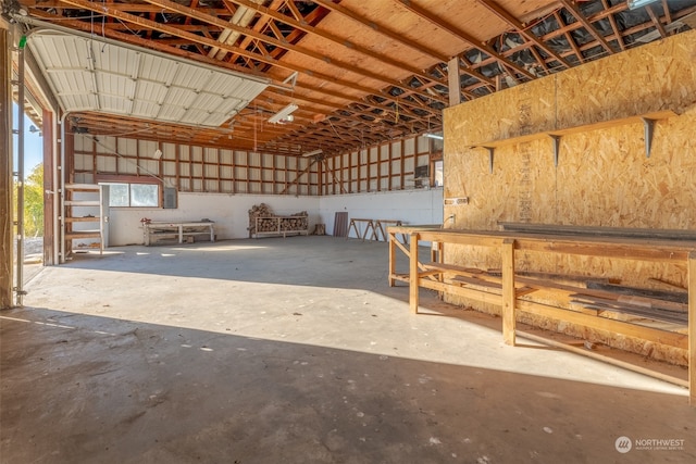 misc room with concrete flooring