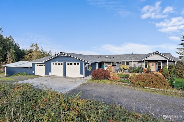 single story home featuring a garage