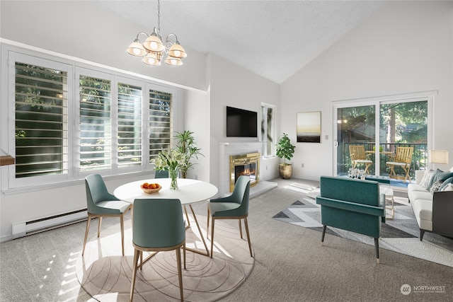 carpeted dining room featuring a baseboard radiator, high vaulted ceiling, a wealth of natural light, and a chandelier