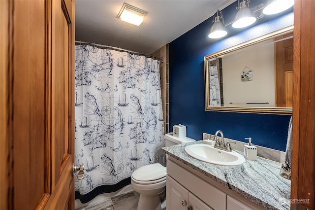308 De Haro Ln, San Juan Island, WA 98250 - bathroom featuring vanity, curtained shower, and toilet