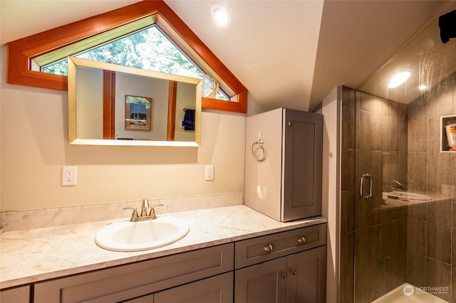 308 De Haro Ln, San Juan Island, WA 98250 - bathroom featuring vanity, lofted ceiling, and a shower stall