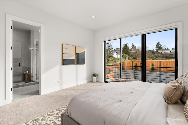 bedroom with carpet flooring and multiple windows