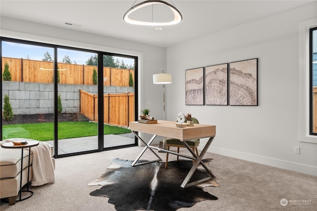 view of carpeted home office