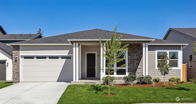 ranch-style home with a front lawn and a garage