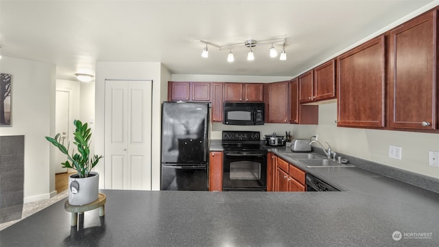 kitchen featuring sink and black appliances