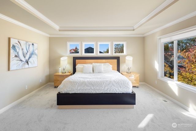 bedroom featuring light carpet, crown molding, and multiple windows