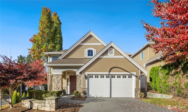 view of front of home with a garage