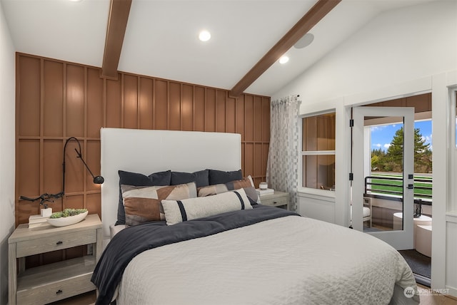 bedroom featuring lofted ceiling with beams and access to outside