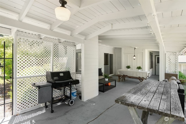 view of patio / terrace with ceiling fan and grilling area