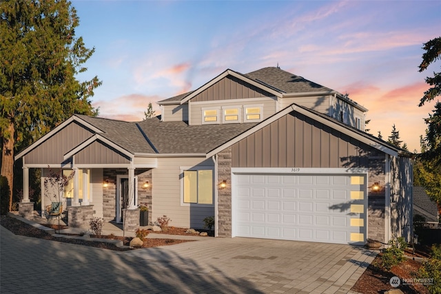 craftsman house featuring a garage