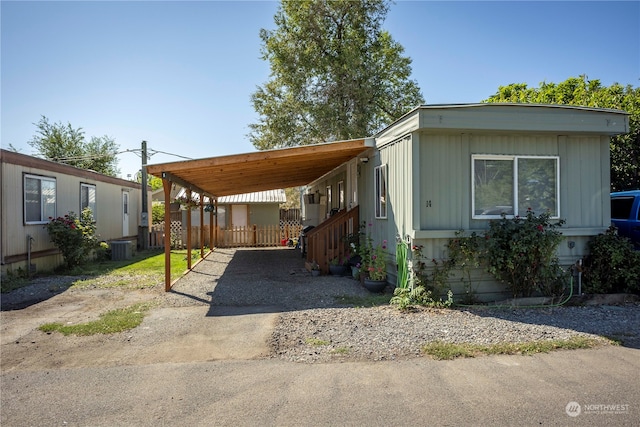 exterior space featuring a carport