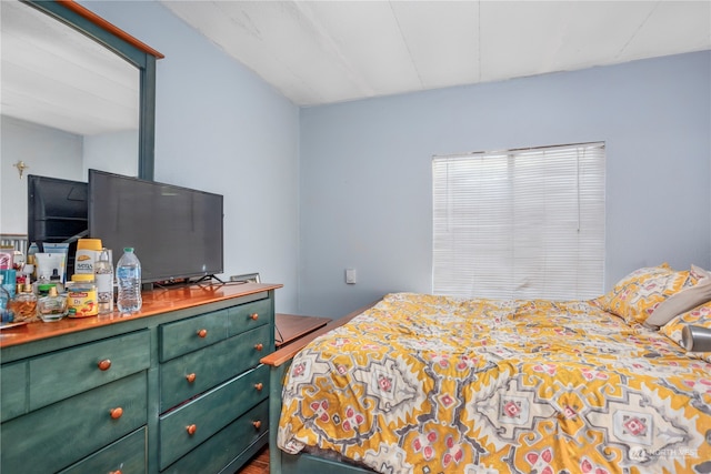 bedroom featuring wood-type flooring