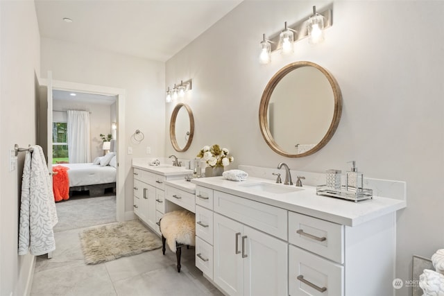 bathroom featuring vanity and tile patterned flooring