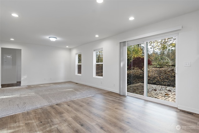 spare room with light wood-type flooring