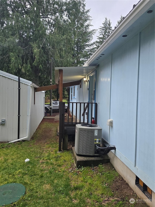 view of yard featuring central AC unit