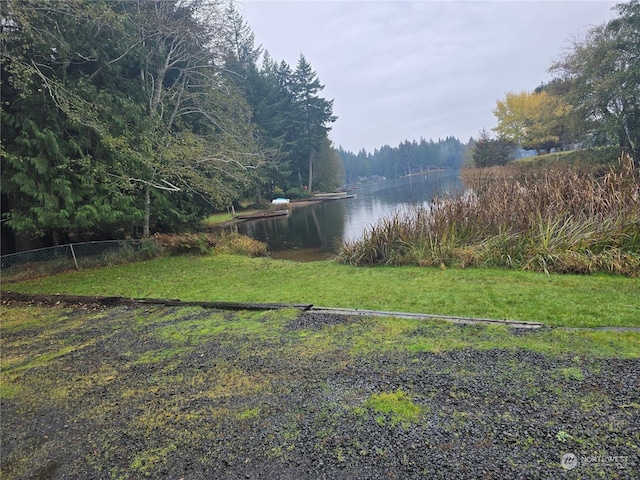 view of yard with a water view