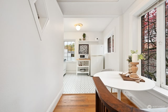 dining space featuring light hardwood / wood-style flooring