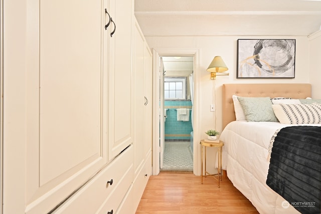 bedroom with light hardwood / wood-style flooring