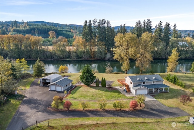 drone / aerial view featuring a water view