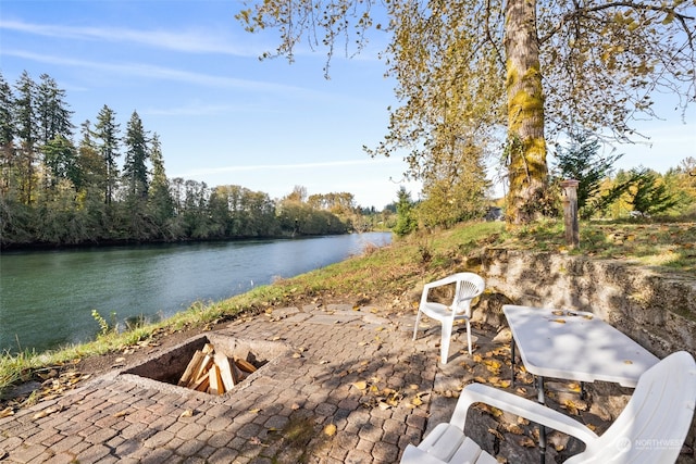 view of patio featuring a water view