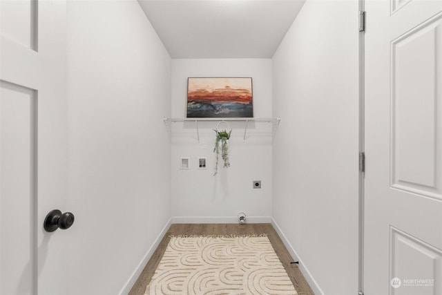 clothes washing area with electric dryer hookup, light hardwood / wood-style floors, and hookup for a washing machine