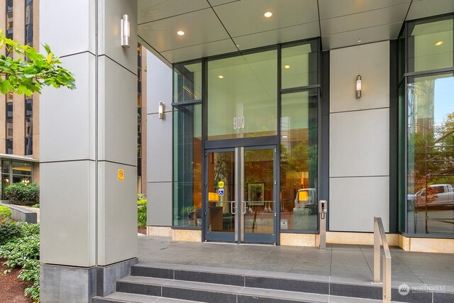 909 5th Ave Unit 2103, Seattle, WA 98104 - doorway to property featuring covered porch
