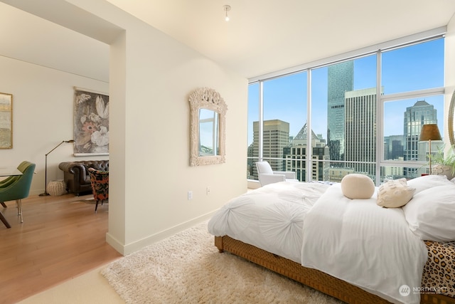 bedroom featuring hardwood / wood-style flooring